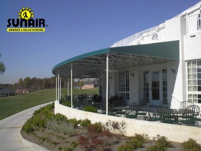 Canopy%20on%20patio%20with%20round%20wall%20by%20Sunair.JPG
